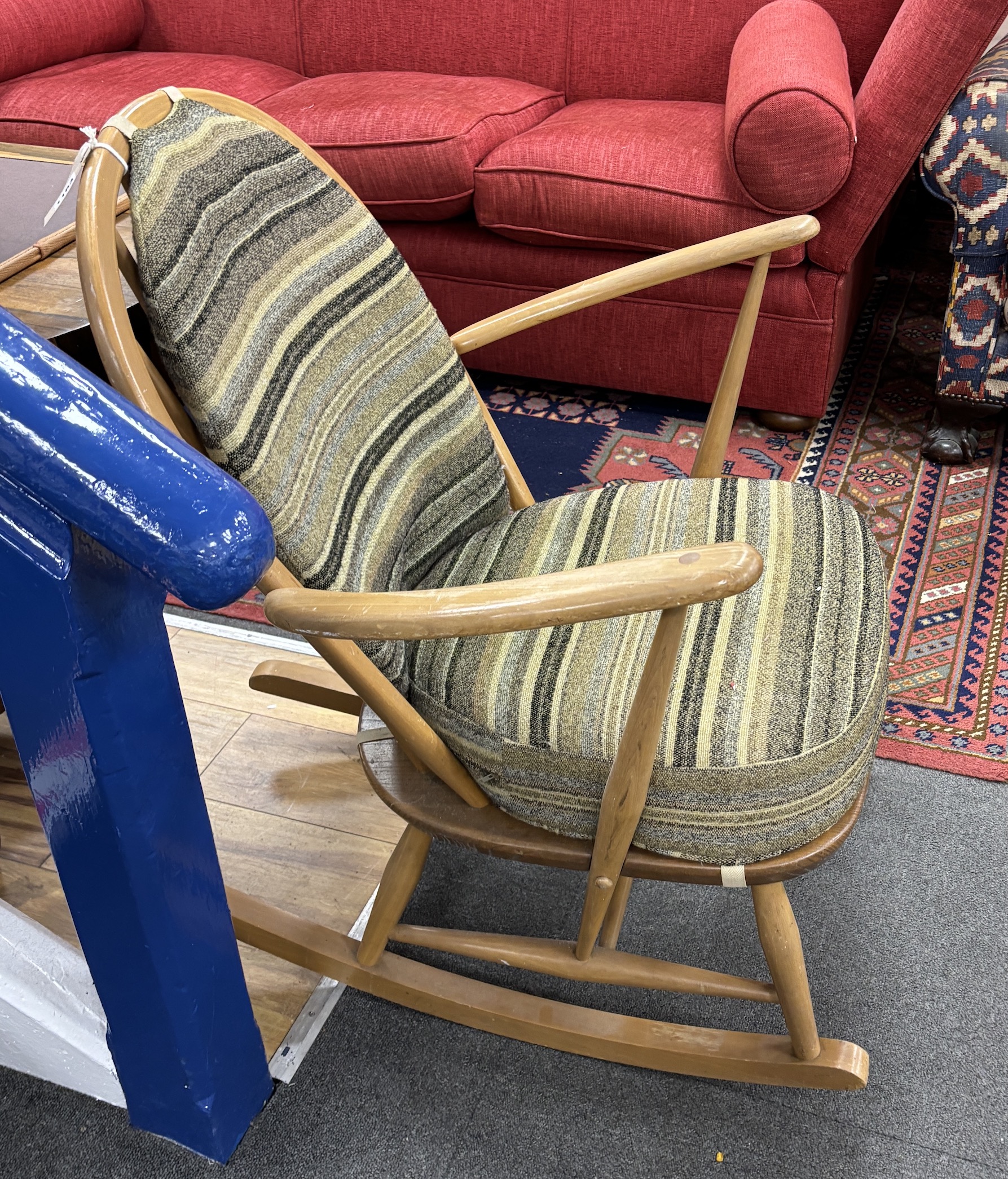 An Ercol elm and beech rocking chair, width 70cm, depth 78cm, height 85cm